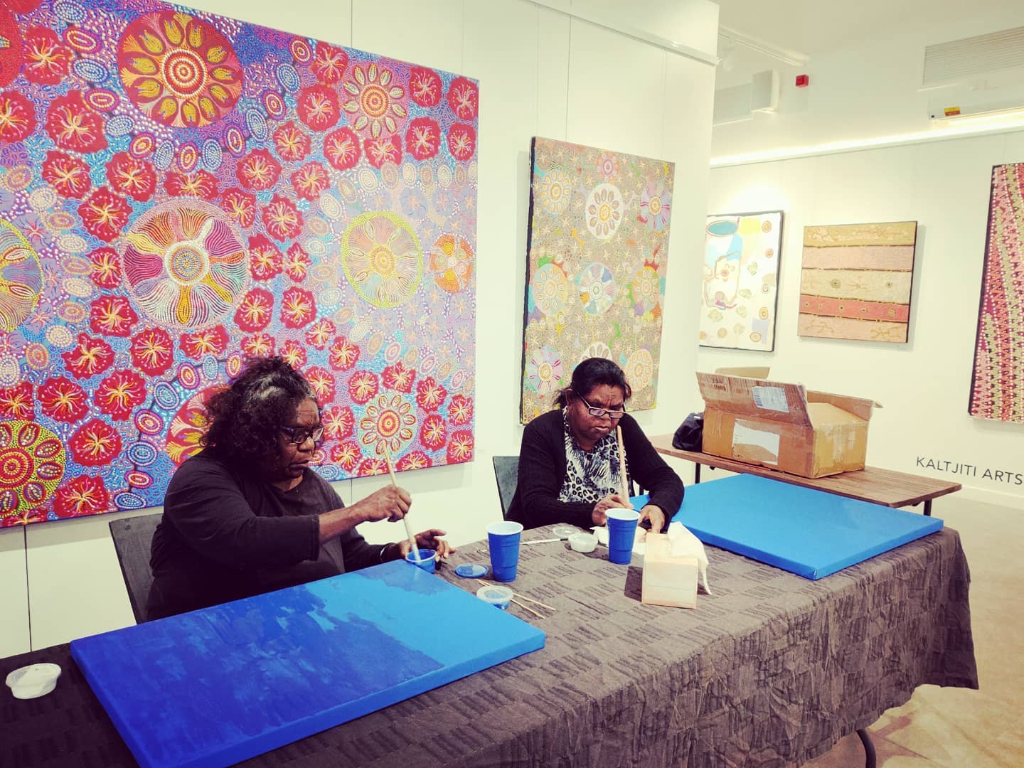 Alison Multa and Pam Brown painting at the Gallery of Central Australia.